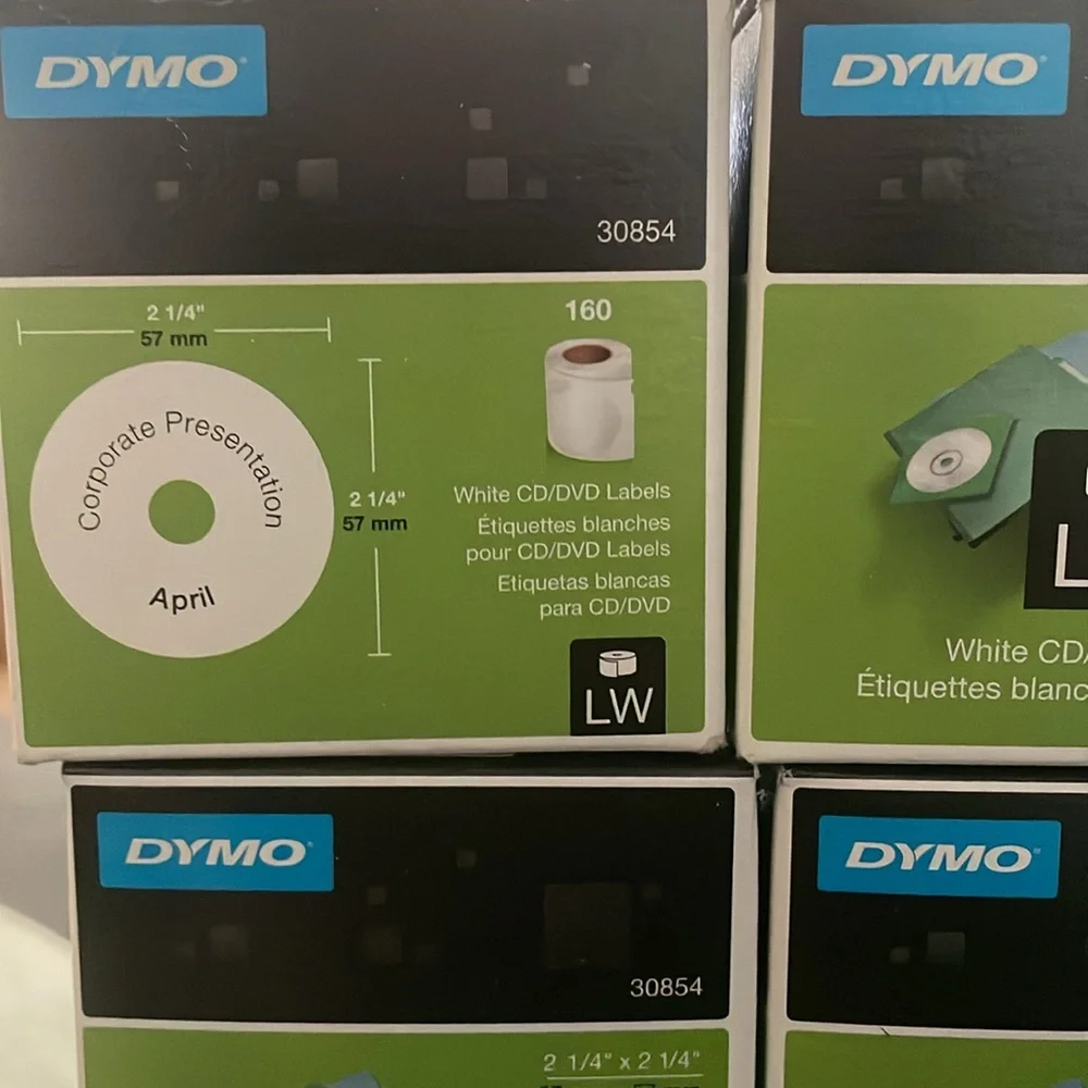 9, new in box, Dymo CD / DVD labels. Each roll has 160 labels